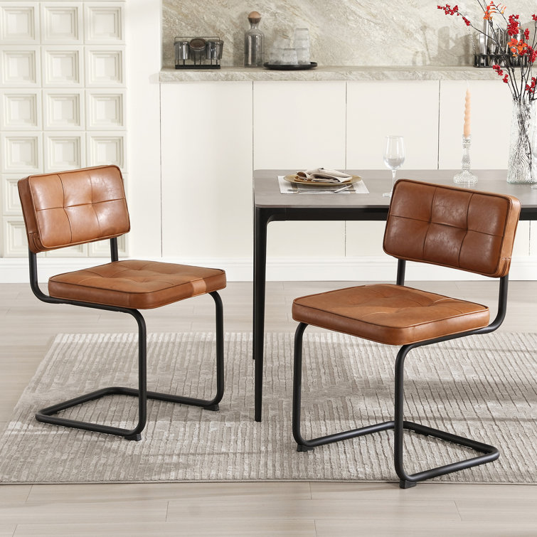 Leather cantilever dining chairs discount